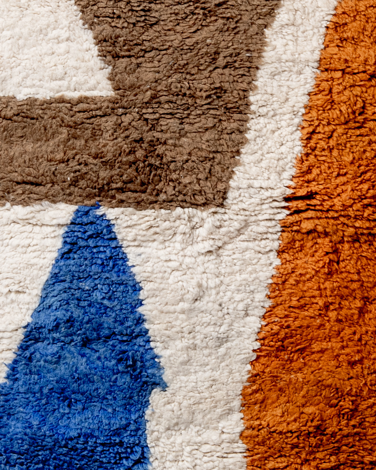 Modern, designer, handcrafted Berber rug from Morocco. Beniourain carpet with beautiful colours and patterns and fluffy wool texture.